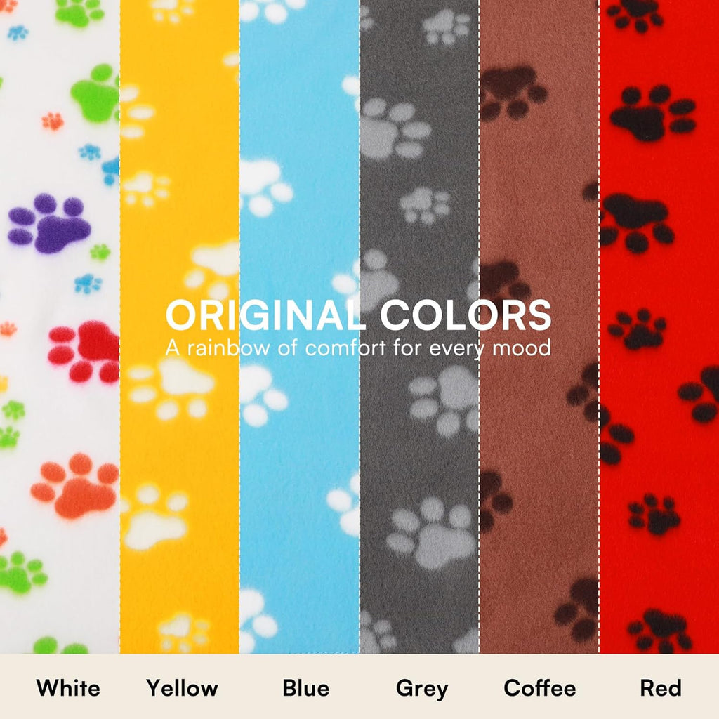 LINENLUX soft stretchy pet blankets spread out on a living room couch