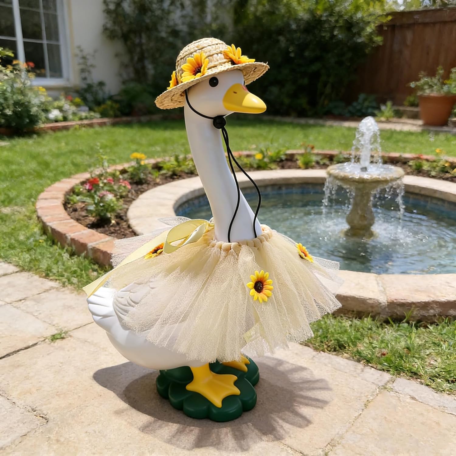 Summer lawn ornament straw hat with yellow flower accents.