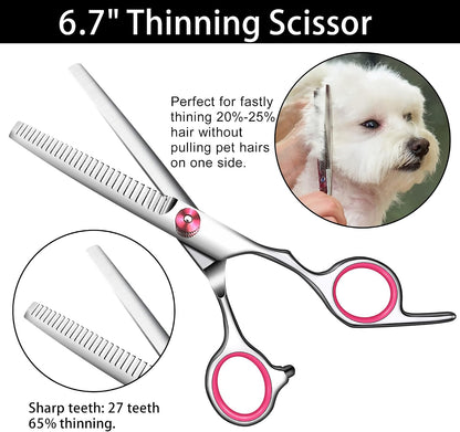 Ergonomic right handed pet shears handle with pink rubber ring inserts.