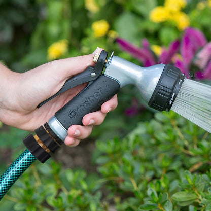GardEasy universal fit watering components connected directly to a standard green outdoor garden hose.