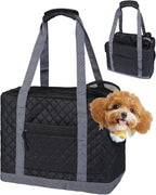 Small pet travel carrier on luggage handle
