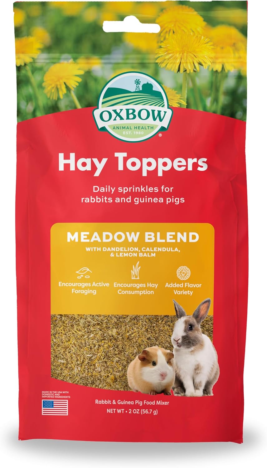 Oxbow Garden Blend treat mix poured out next to its original two ounce packaging container