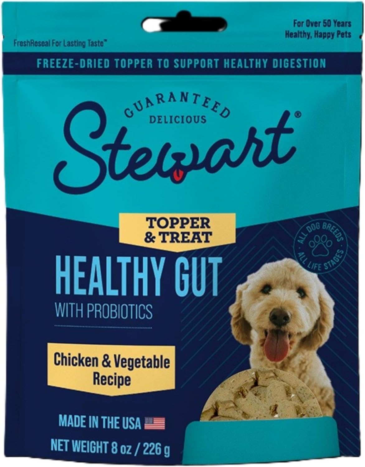 Stewart freeze dried dog topper being sprinkled over dry kibble in a bowl