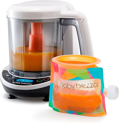 Baby Brezza One Step Baby Food Maker Deluxe front view on a clean kitchen counter showing LCD control panel