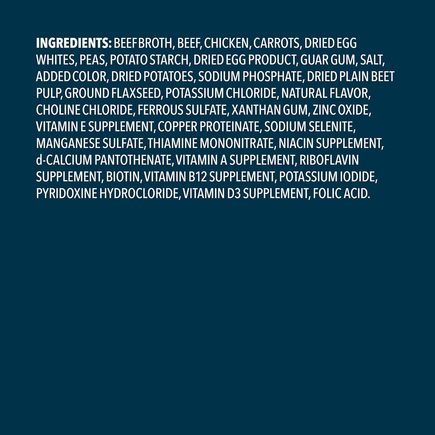 Wag wet dog food nutritional information and ingredient label close up.