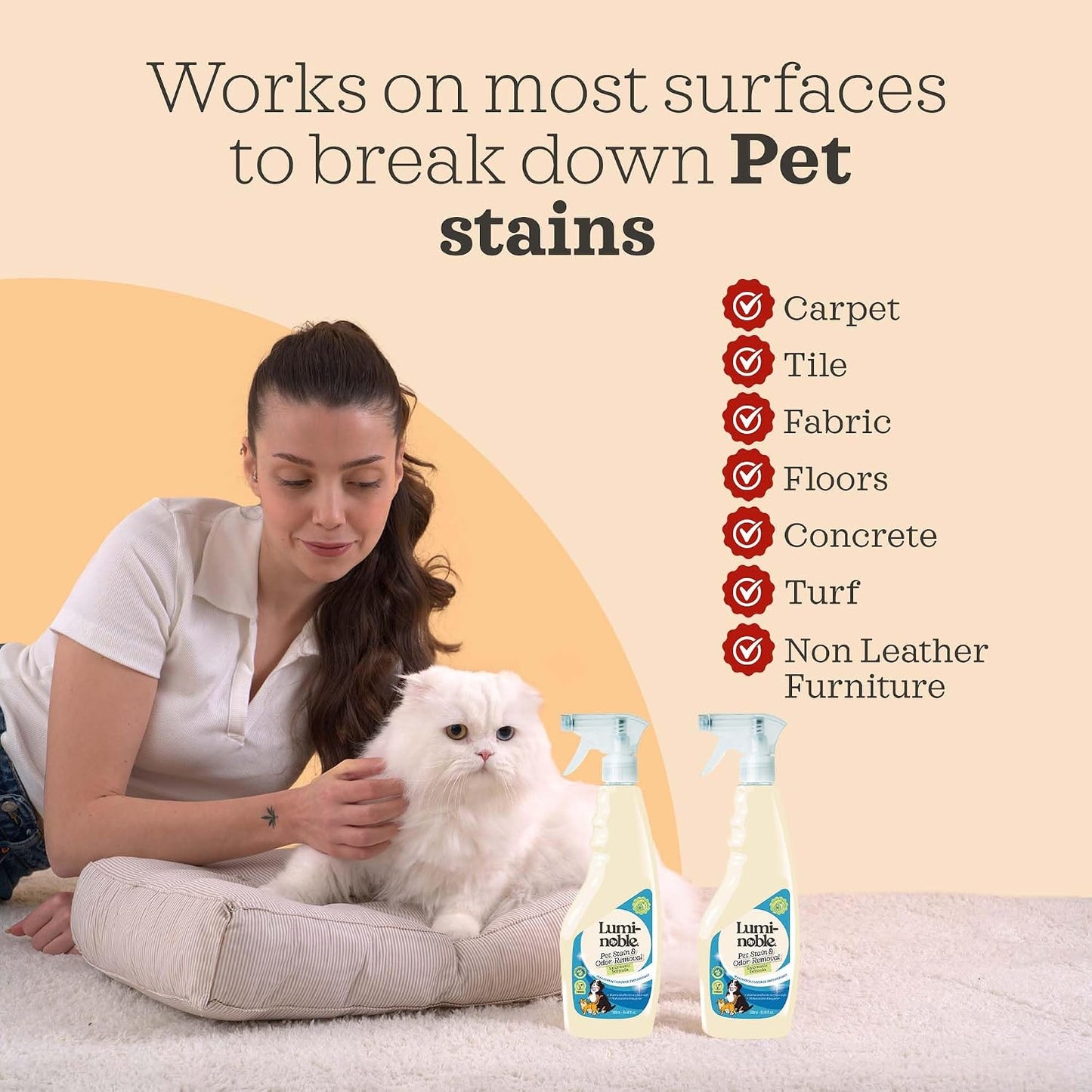 Eco-friendly vegan dog urine cleaner spray on living room fabric upholstery.