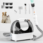 SpeedBoost Pet Grooming Kit front view showcasing the white vacuum unit and main attachments.