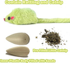 Ragdoll cat looking at the realistic five inch long prefilled catnip mouse toy