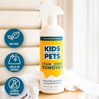 Close up of Kids 'N' Pets spray bottle label showing enzyme technology