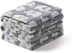 Premium pet blanket throw being used to protect a living room sofa