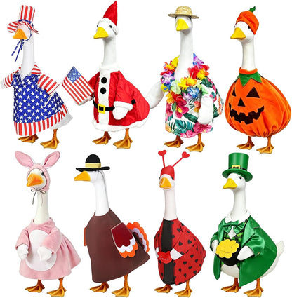Kedaijin holiday porch goose outfits eight piece festive clothing set front view on garden statue