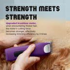 FuzzyFix cordless pet hair trimmer being held to demonstrate the ergonomic anti fatigue handle.