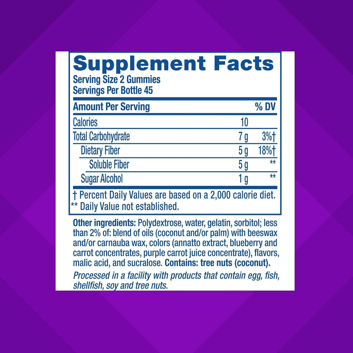 Vitafusion FiberWell berry and peach flavored gummies closeup