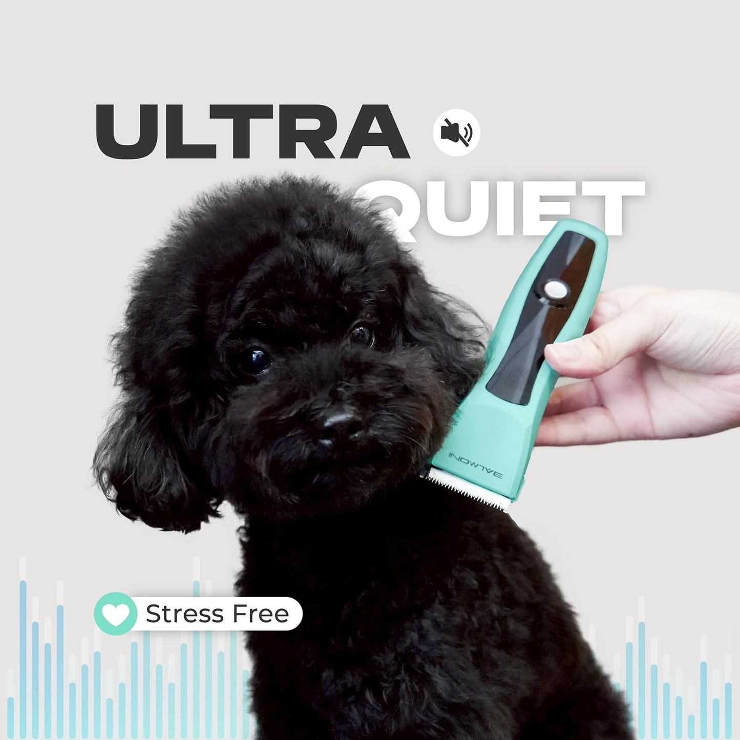 Rechargeable dog and cat grooming clipper close up focusing on the single power button interface.