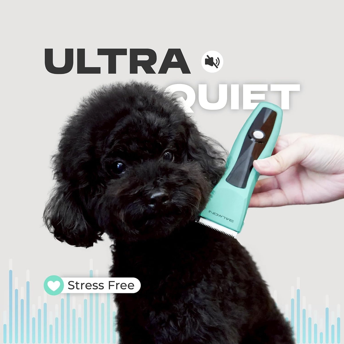 Rechargeable dog and cat grooming clipper close up focusing on the single power button interface.