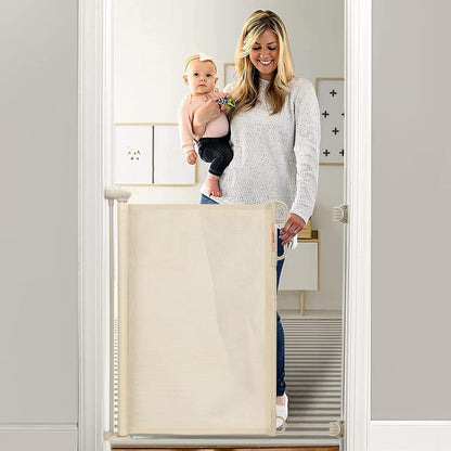 Momcozy Retractable Baby Gate front view installed in a modern home doorway