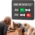 Abudada dog feeding reminder chart front view on a refrigerator door