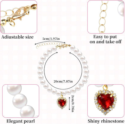 Close up view of the high quality imitation pearls and sparkling heart rhinestone on the cat collar