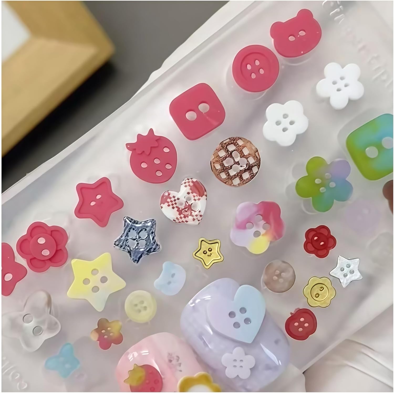 Gehaiwo 3D buttons nail mold front view showing various miniature cavities for DIY charms.