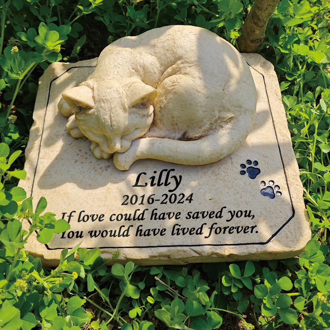 Custom cat headstone for grave garden decor with engraved paw prints.