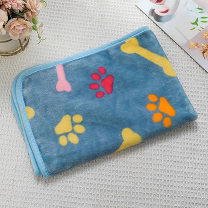 Luciphia soft fluffy premium fleece pet blanket front view featuring blue paw print pattern.
