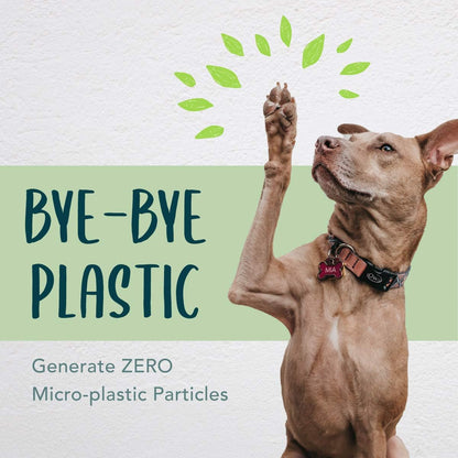 Moonygreen eco friendly dog poop bag rolls next to recycled paper core.