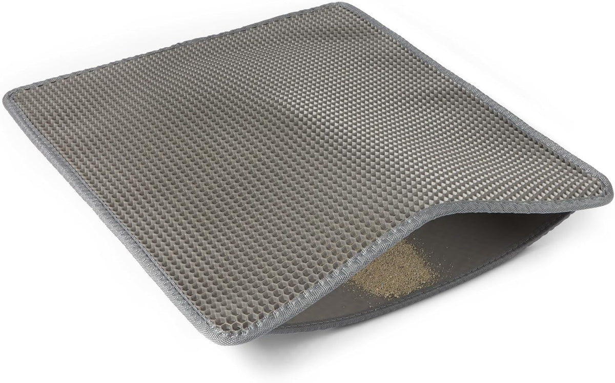 Amazon Basics non-slip cat litter trapper mat placed near a litter box