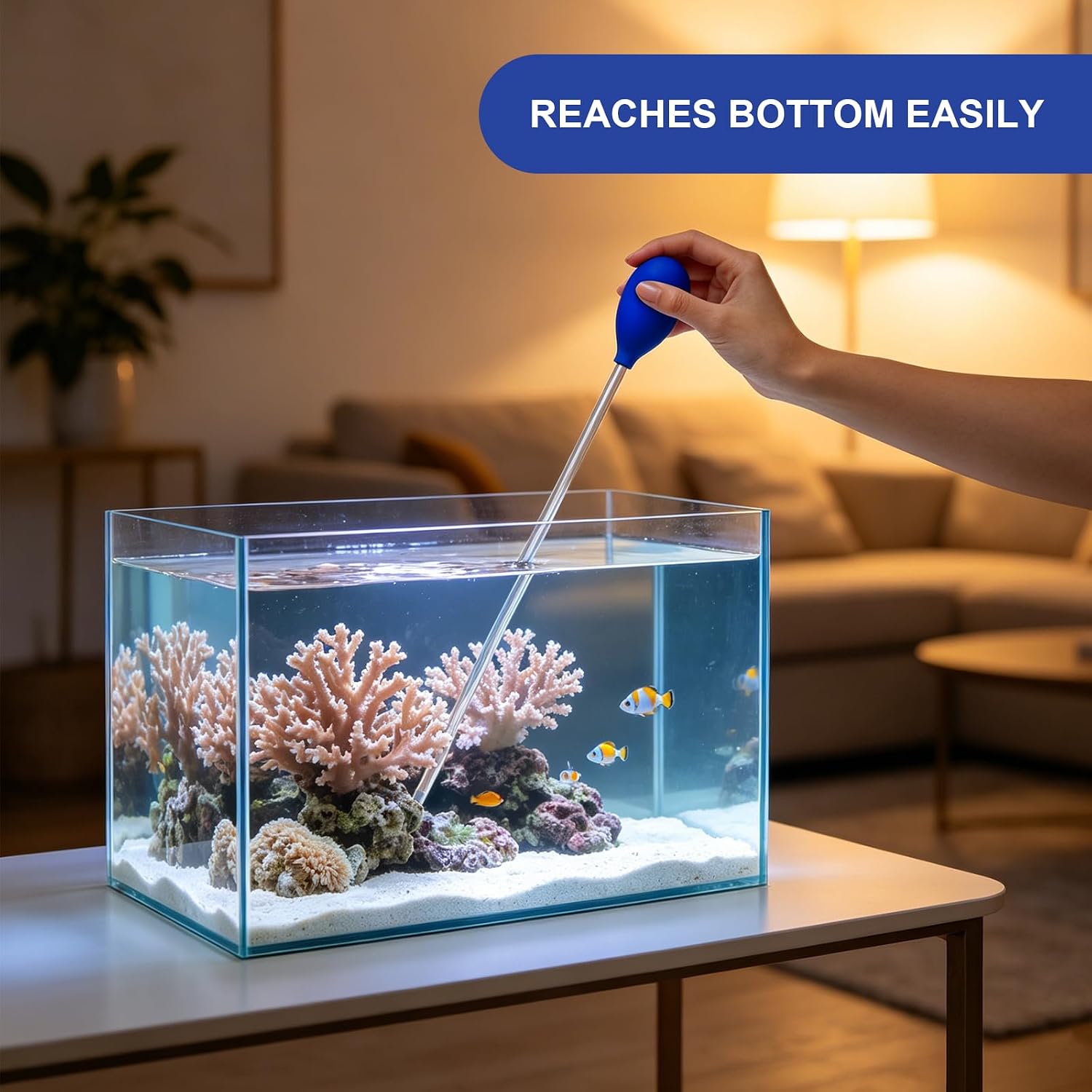Wrexon extra long pipette removing waste and detritus from deep fish tank corners.