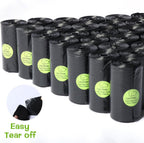 Black heavy-duty pet waste bags with green bone-shaped dispensers for dog walks.