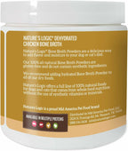 Scoop of Natures Logic chicken bone broth powder for dogs