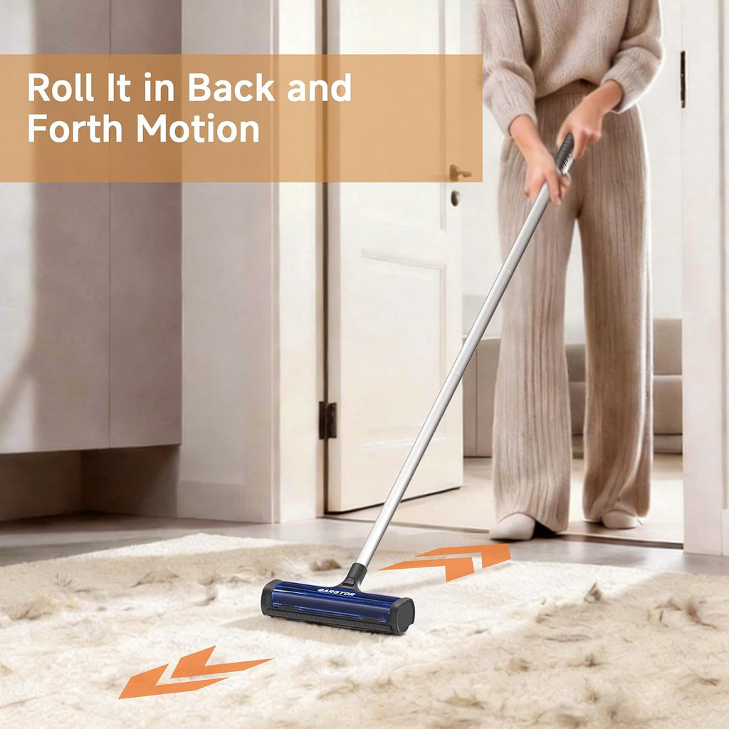 Garstor long handle dog hair remover being used on fabric couch upholstery