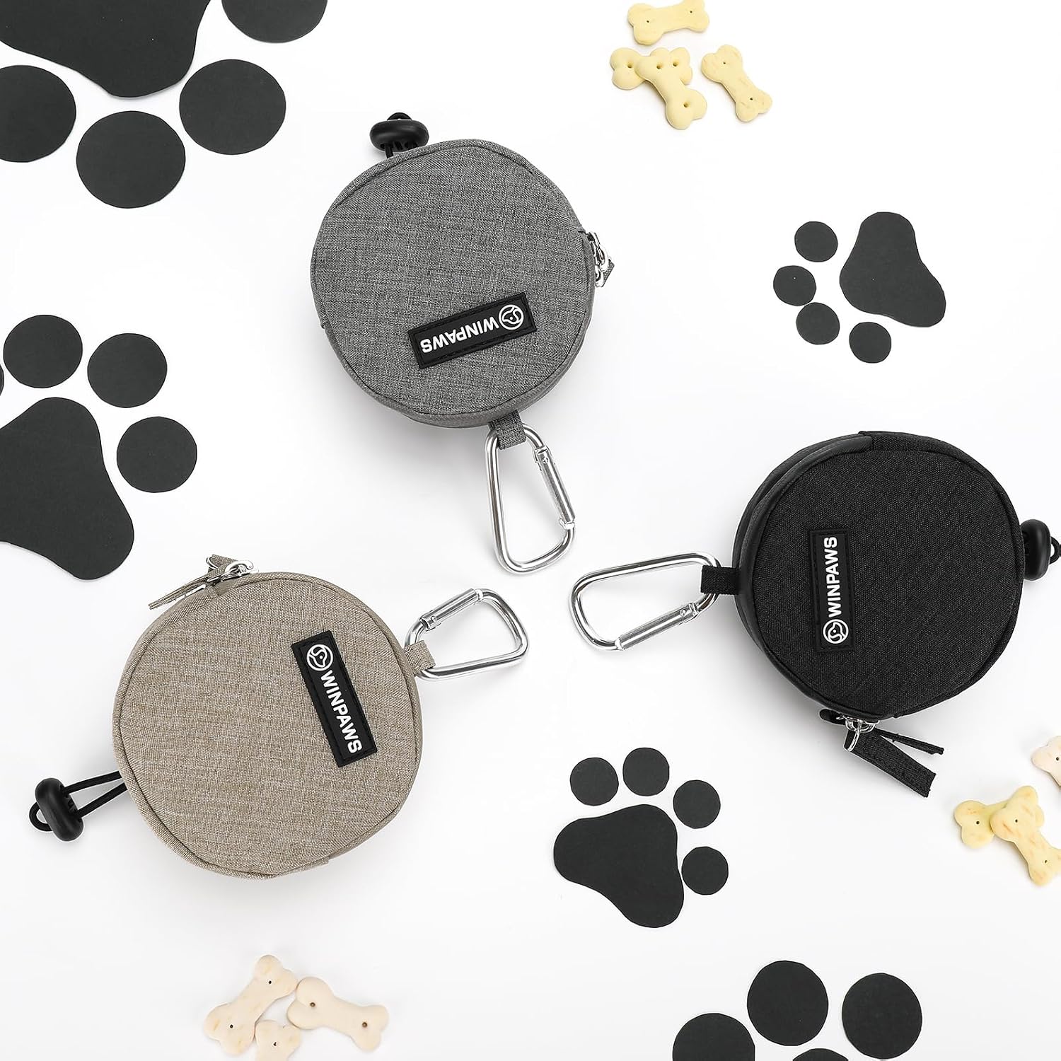 Winpaws compact round pet travel bag held by a pet owner during outdoor training