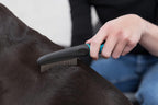 Trixie branding on pet grooming flea comb handle