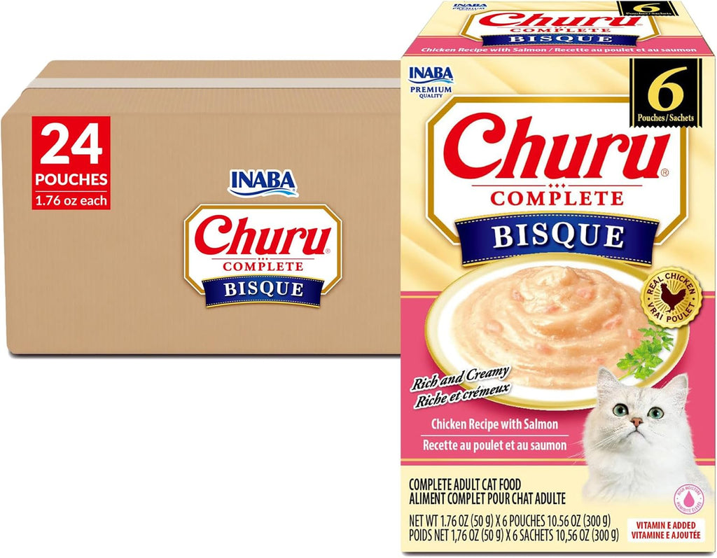 Silky smooth chicken purÃ©e wet cat food being poured from the pouch