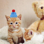 Adjustable elastic chin strap detail on a knitted pet snake hat