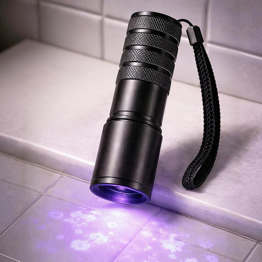 Generic portable blacklight flashlight front view highlighting the twelve light emitting diode bulbs for pet stain detection.