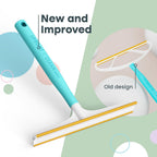 Uproot Clean Pro tool removing pet hair from a grey couch