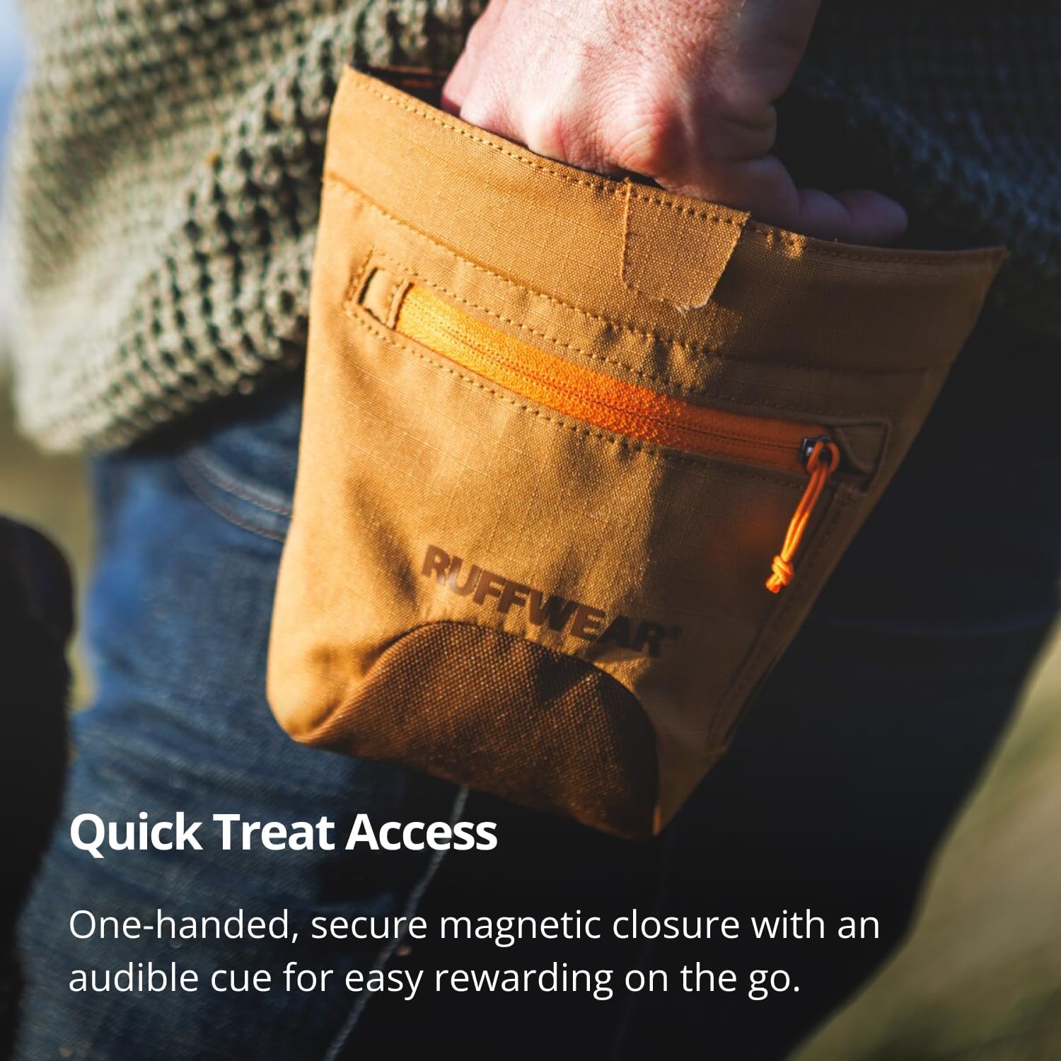 Ruffwear waist-worn dog training bag showing one-handed magnetic closure