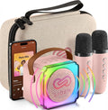 LIOEM mini karaoke machine for kids front view showing pink Bluetooth speaker and two wireless microphones
