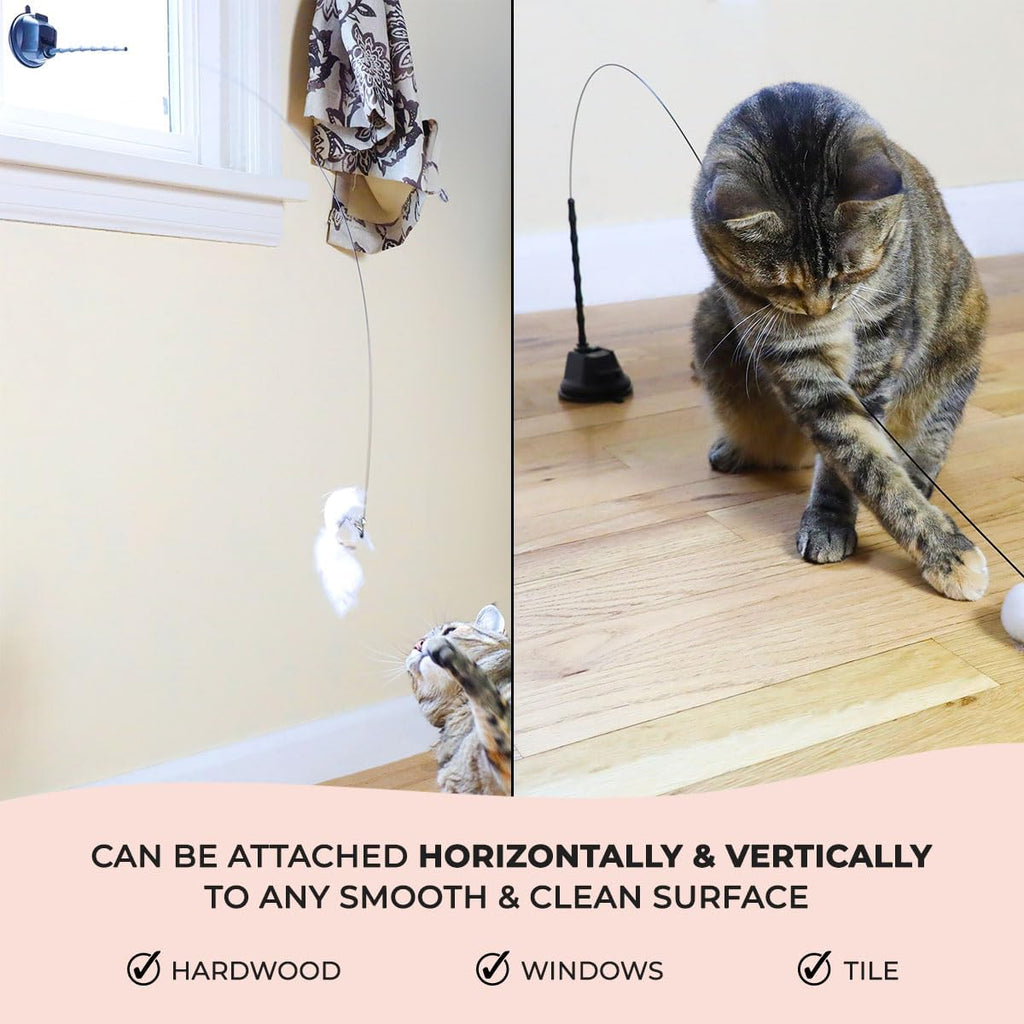 An indoor cat pouncing on the realistic flying bird attachment from Whiskertons.