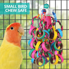 Detailed view of natural palm and corn husk textures on the bird toy.