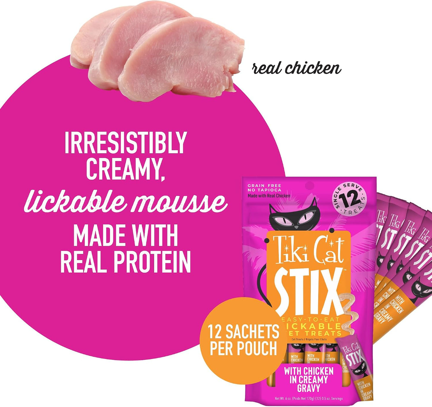 Cat licking Tiki Cat Stix mousse from a spoon