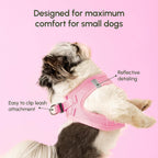 Secure buckle and velcro closure on baby pink dog harness