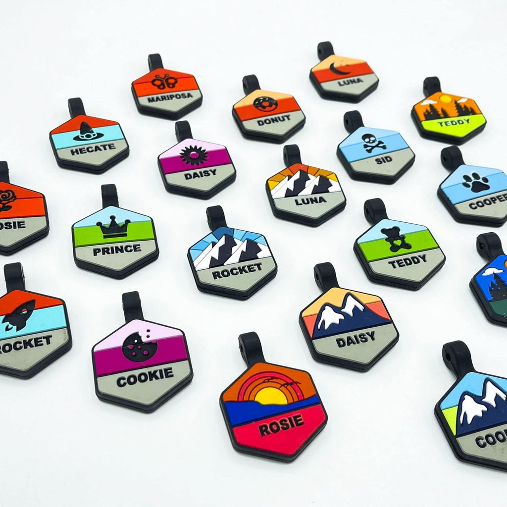 Close up of personalized silicone pet ID name tag in forest night color.