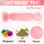 Cat playing with candy shaped catnip kicker pillow