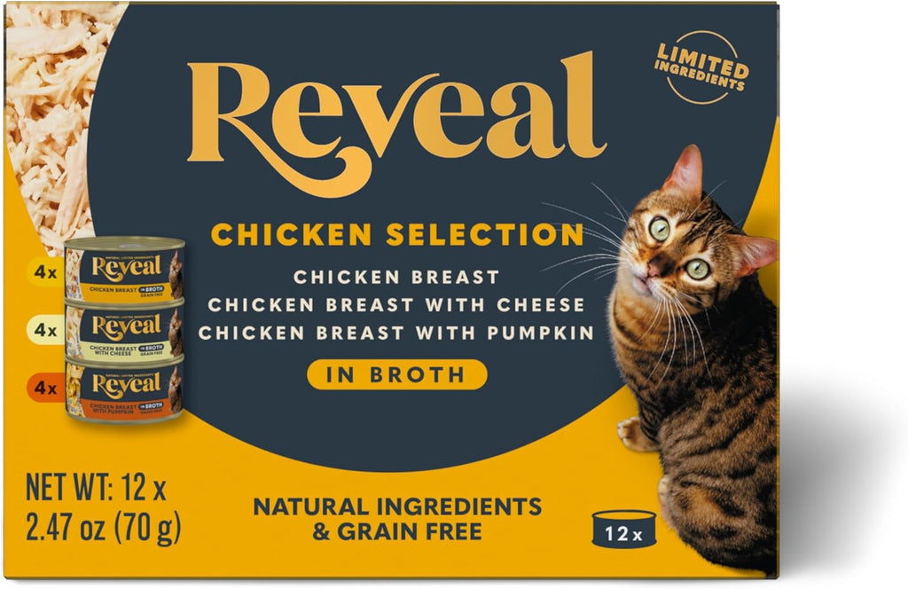 Happy cat enjoying Reveal natural fish recipe cat food