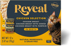 Happy cat enjoying Reveal natural fish recipe cat food
