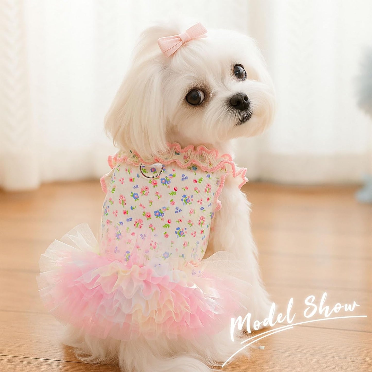 AXIIJGL pet princess frock displaying the integrated metal leash D-ring buckle.