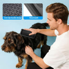 Close up of the ergonomic non slip rubber handle on the Adiwo pet brush.