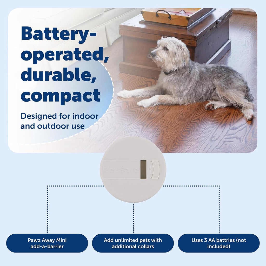 PetSafe pet barrier wireless transmitter placed outdoors near garden flower beds